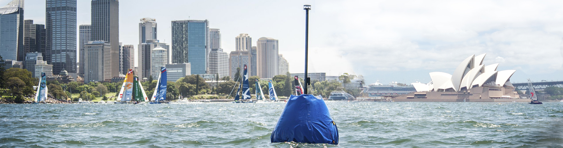 WindBot on a buoy during a race with Sydney Opera House in the background